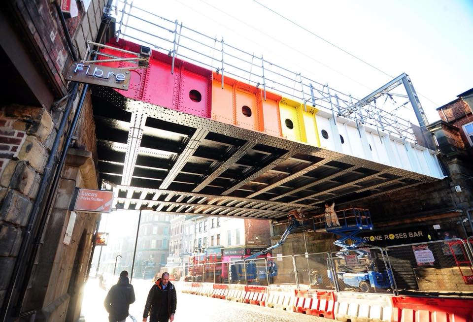 The Freedom Bridge being painted in rainbow colours, 2017